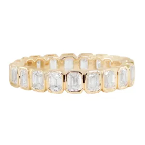 14kt gold petite emerald cut diamond bezel band