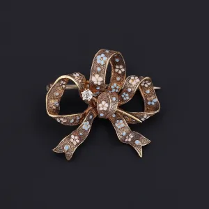 Antique Enamel and Diamond Bow Brooch of 14k Gold