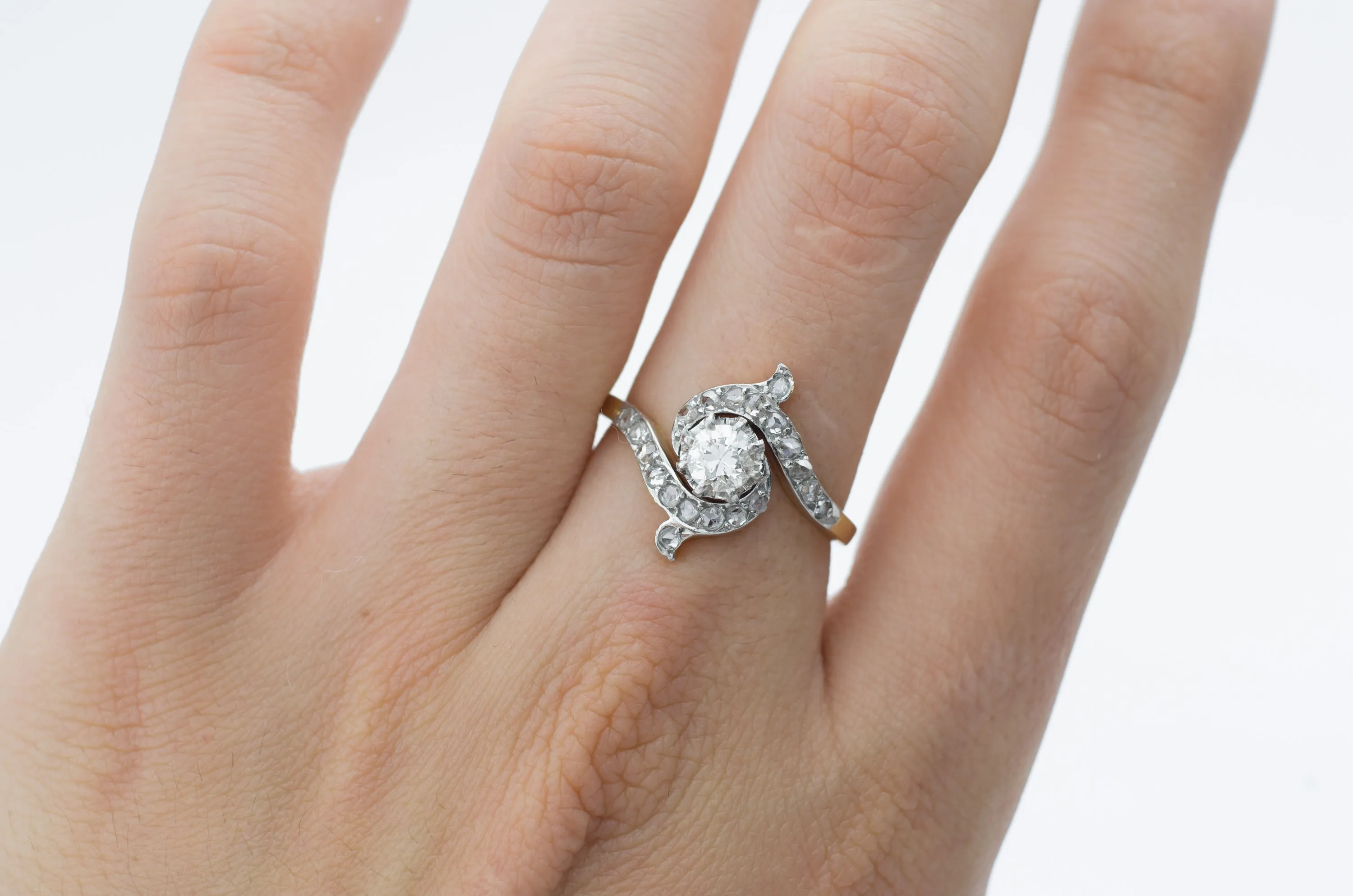 ANTIQUE ROSE CUT AND OEC SWIRL RING