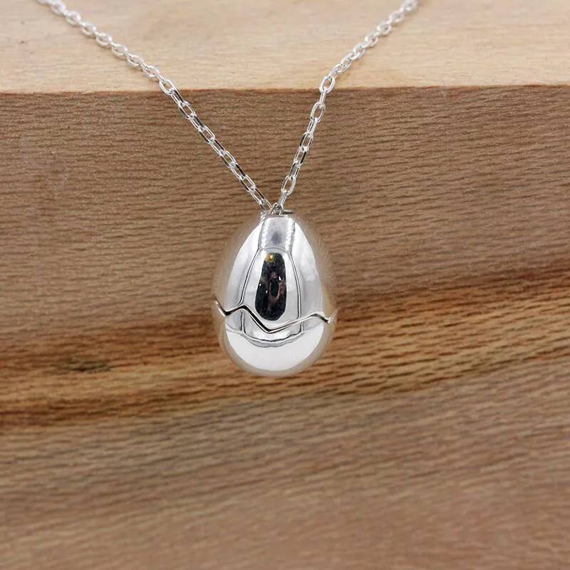 Eggshell Broken Pearl Skull Silver Pendant Necklace