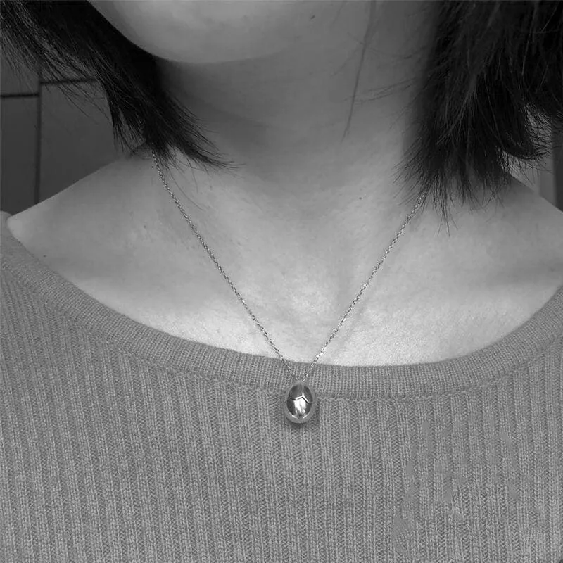 Eggshell Broken Pearl Skull Silver Pendant Necklace