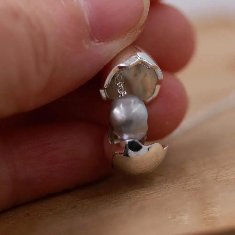 Eggshell Broken Pearl Skull Silver Pendant Necklace