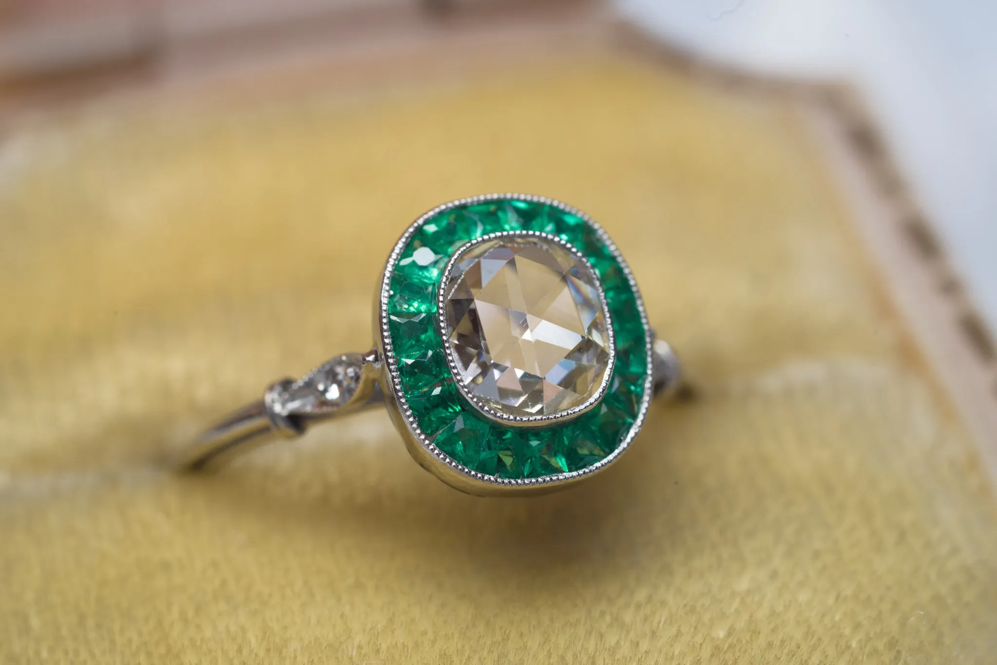 FRENCH CUT EMERALD AND ROSE CUT DIAMOND TARGET RING