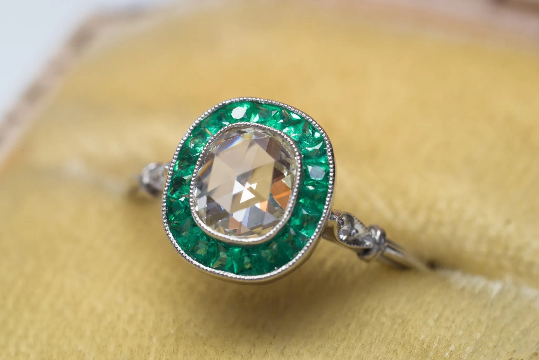 FRENCH CUT EMERALD AND ROSE CUT DIAMOND TARGET RING
