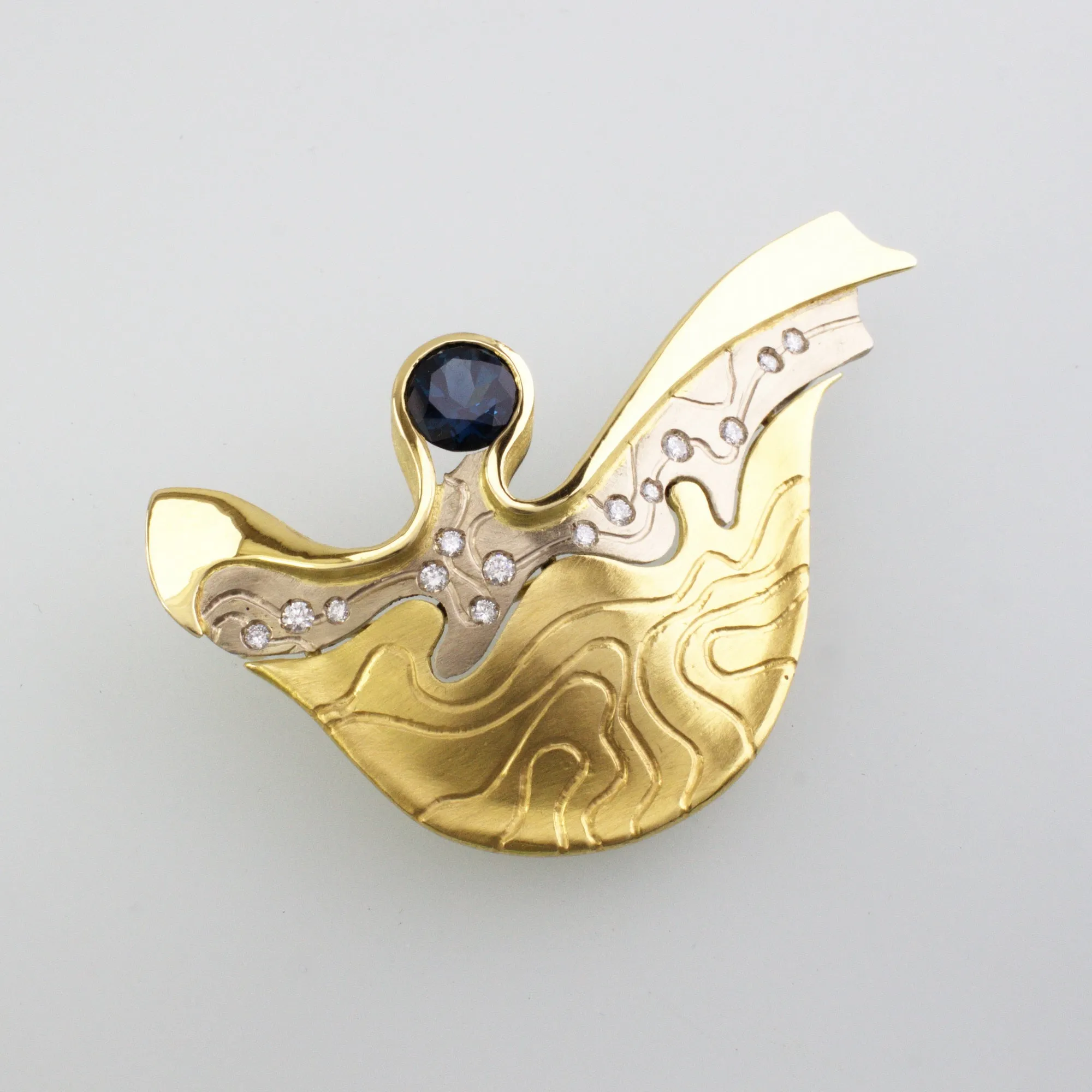 'LANDSCAPE CONTOURS' handcrafted 750 (18kt) yellow & white gold pendant/brooch combination, blue sapphire & diamonds