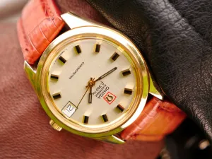 Omega F300 solid gold