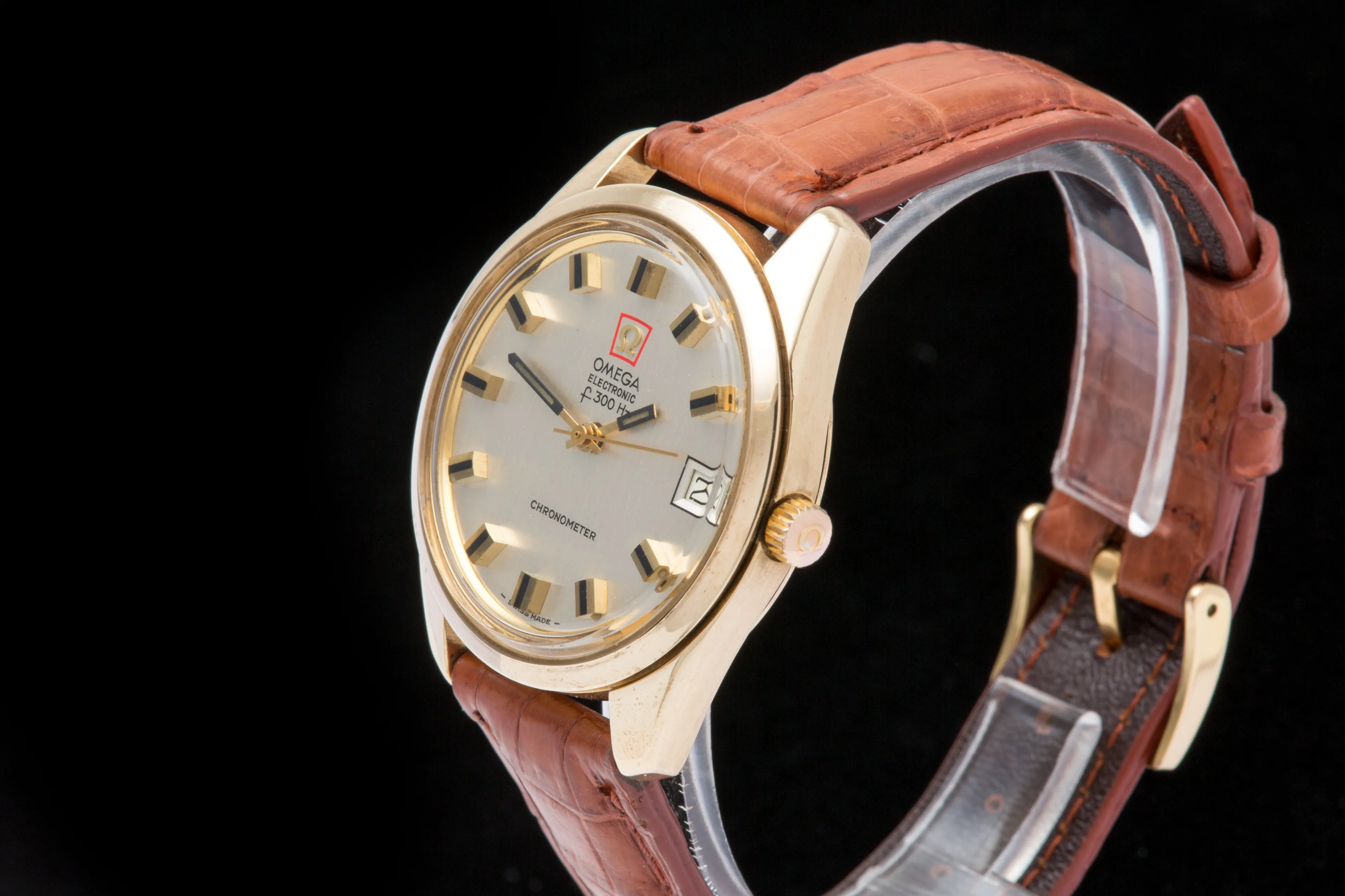 Omega F300 solid gold