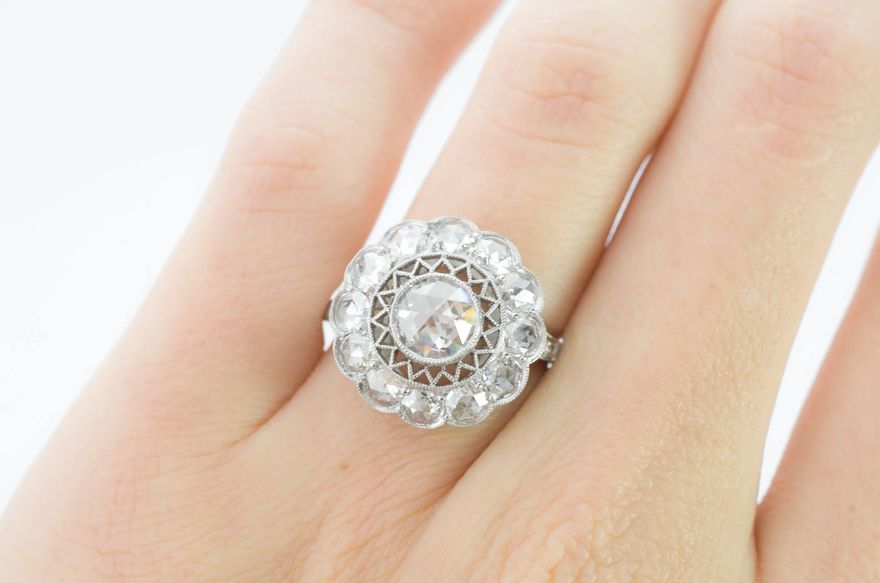 ROSE CUT DIAMOND HALO IN PLATINUM