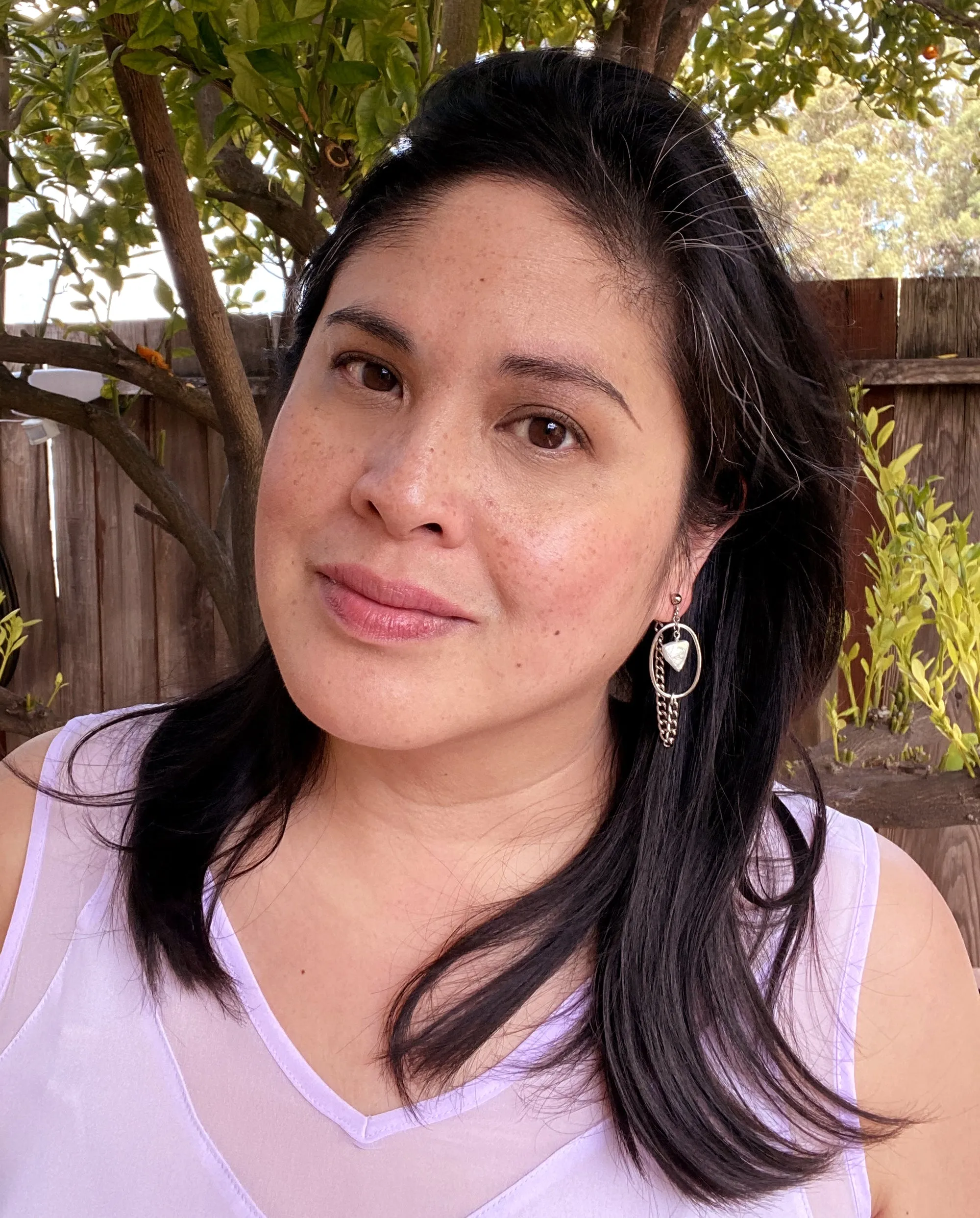 Saturn earrings in pearl triangle