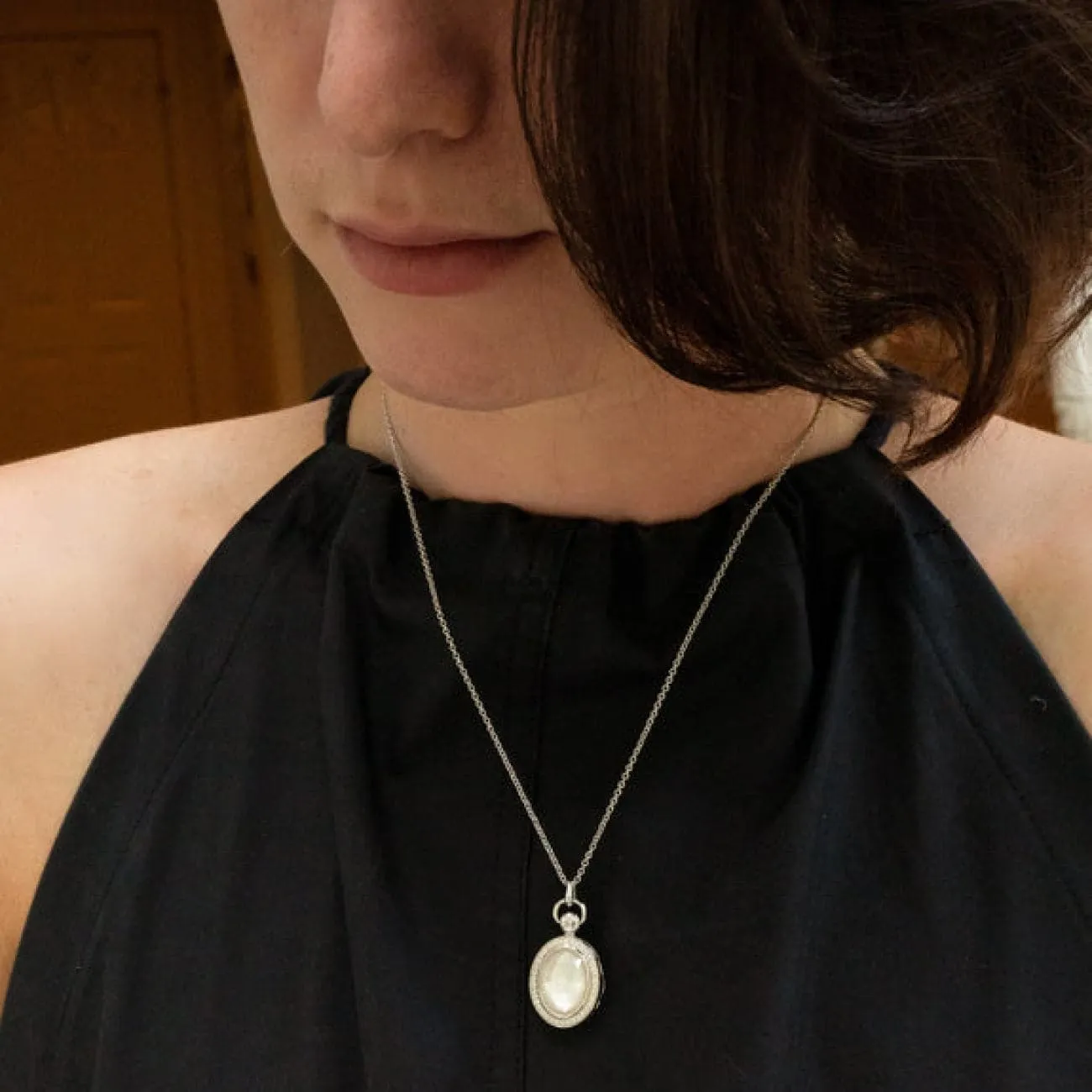 Sterling Silver Blue Topaz over Mother of Pearl Doublet and White Sapphire Border Petite Stone Locket Necklace