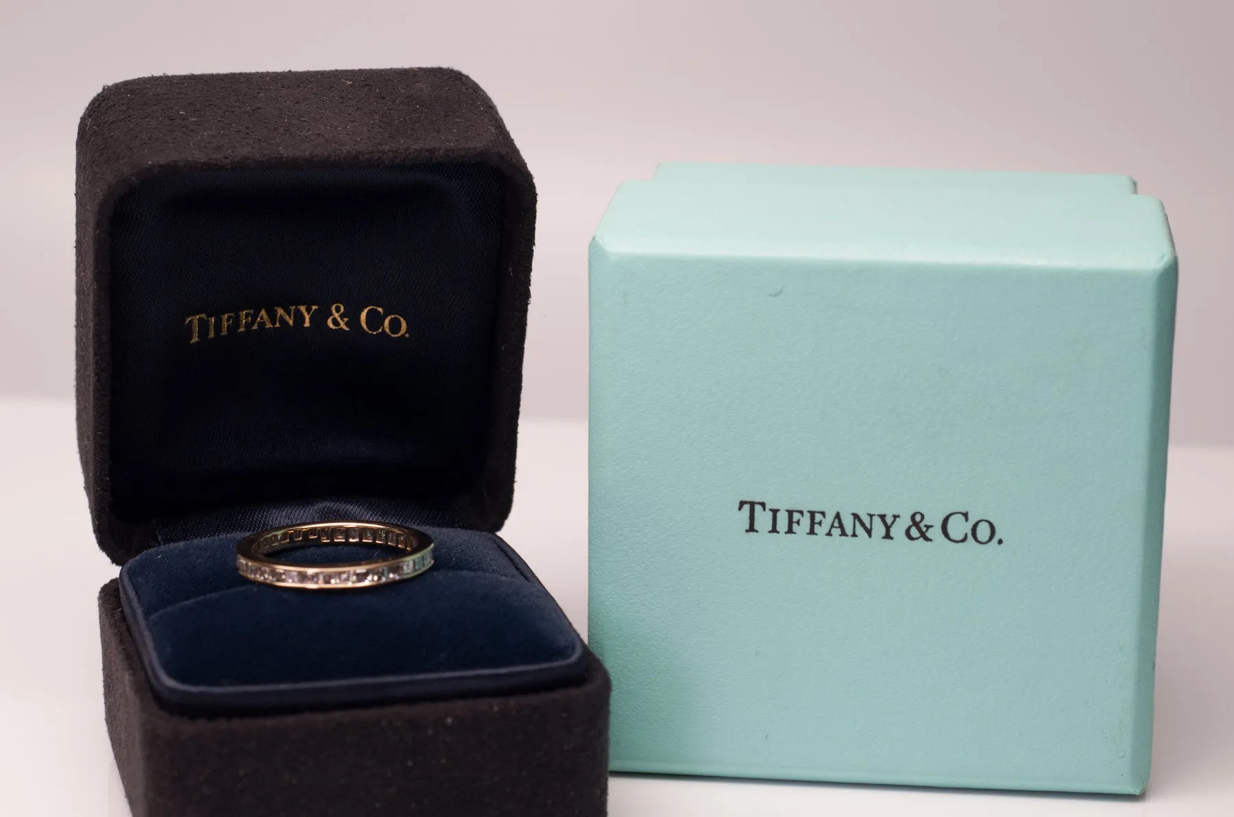 TIFFANY CARRE CUT DIAMOND ETERNITY BAND IN YELLOW GOLD