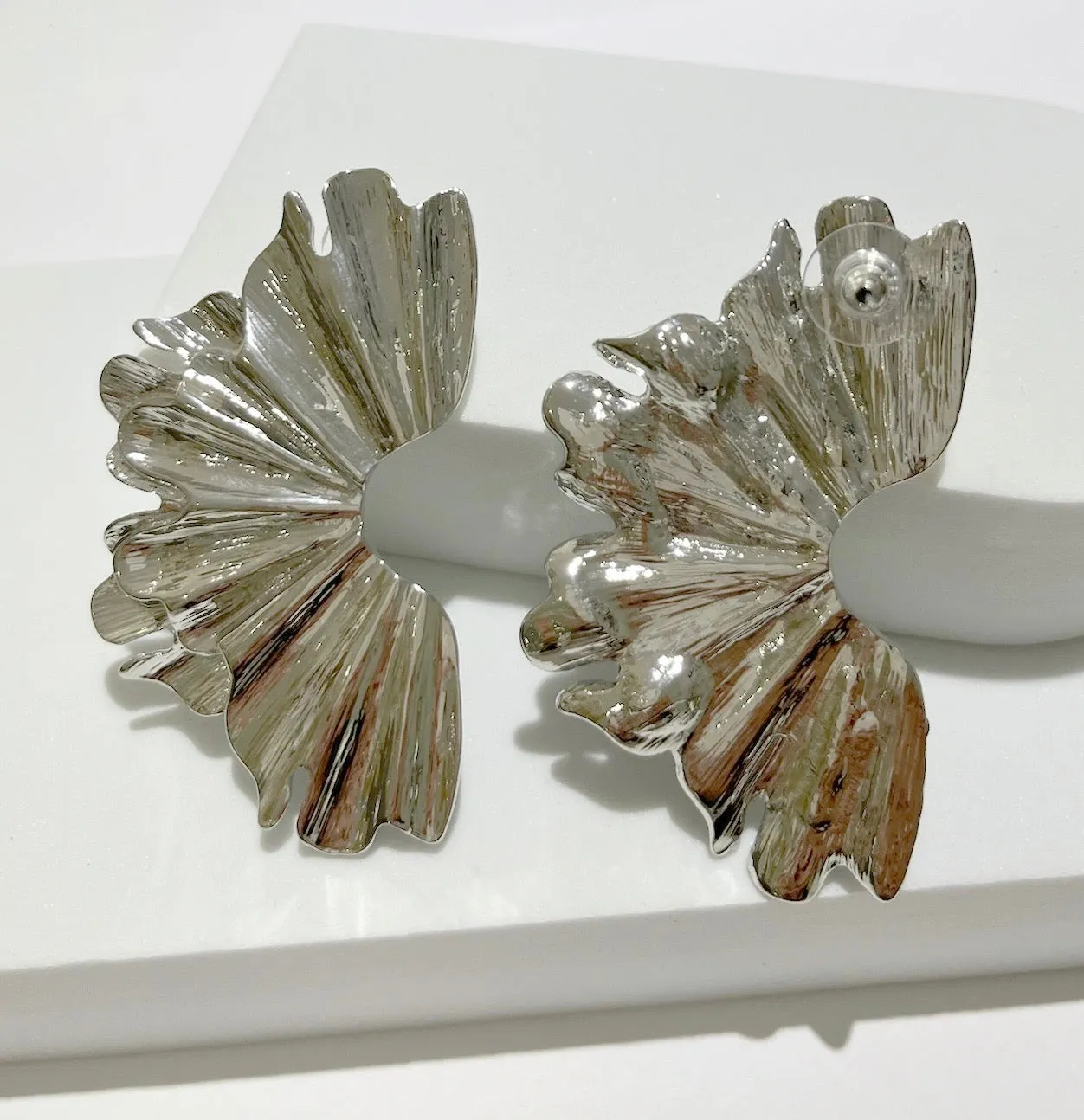 What a Statement Piece Silver Earrings